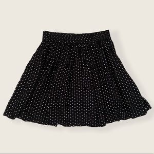 Black skirt with pink heart details